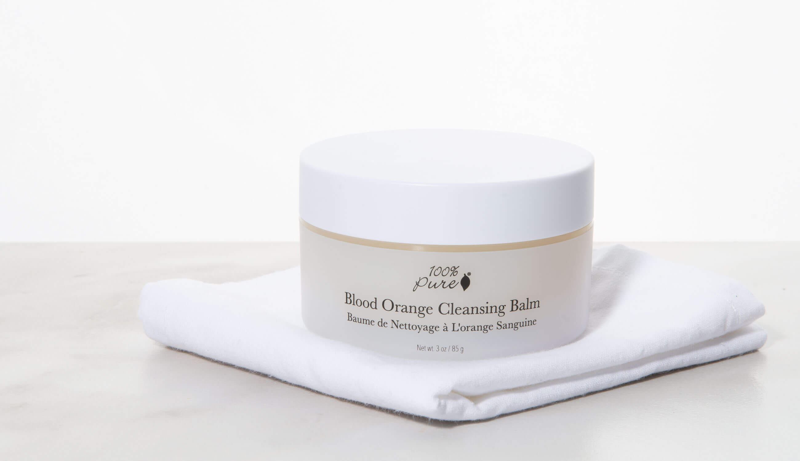 100% Pure Blood Orange Cleansing Balm on a wash cloth