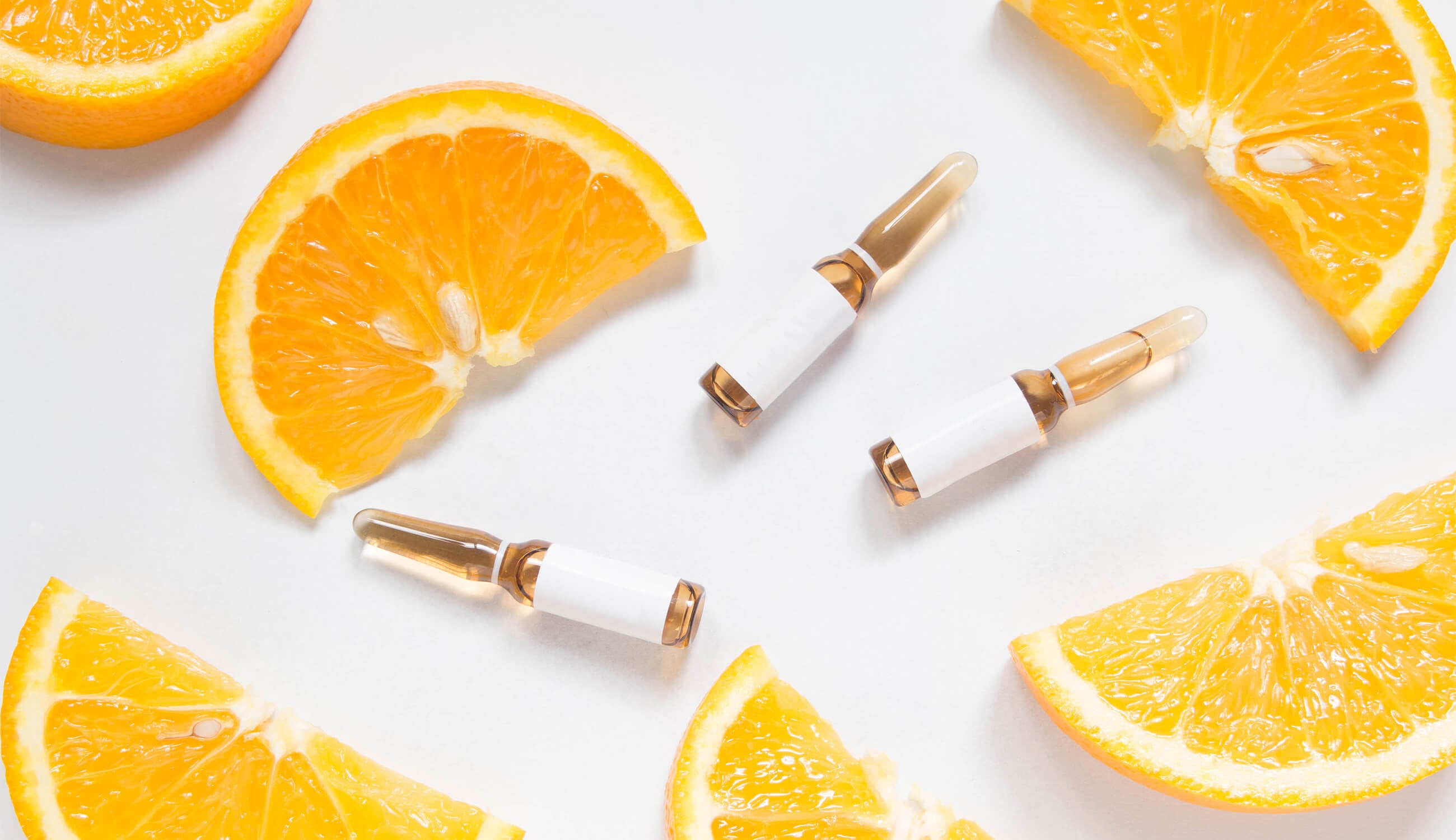 Main Vitamin C Brown Ampule For Injection With Fresh Juicy Orange Fruit