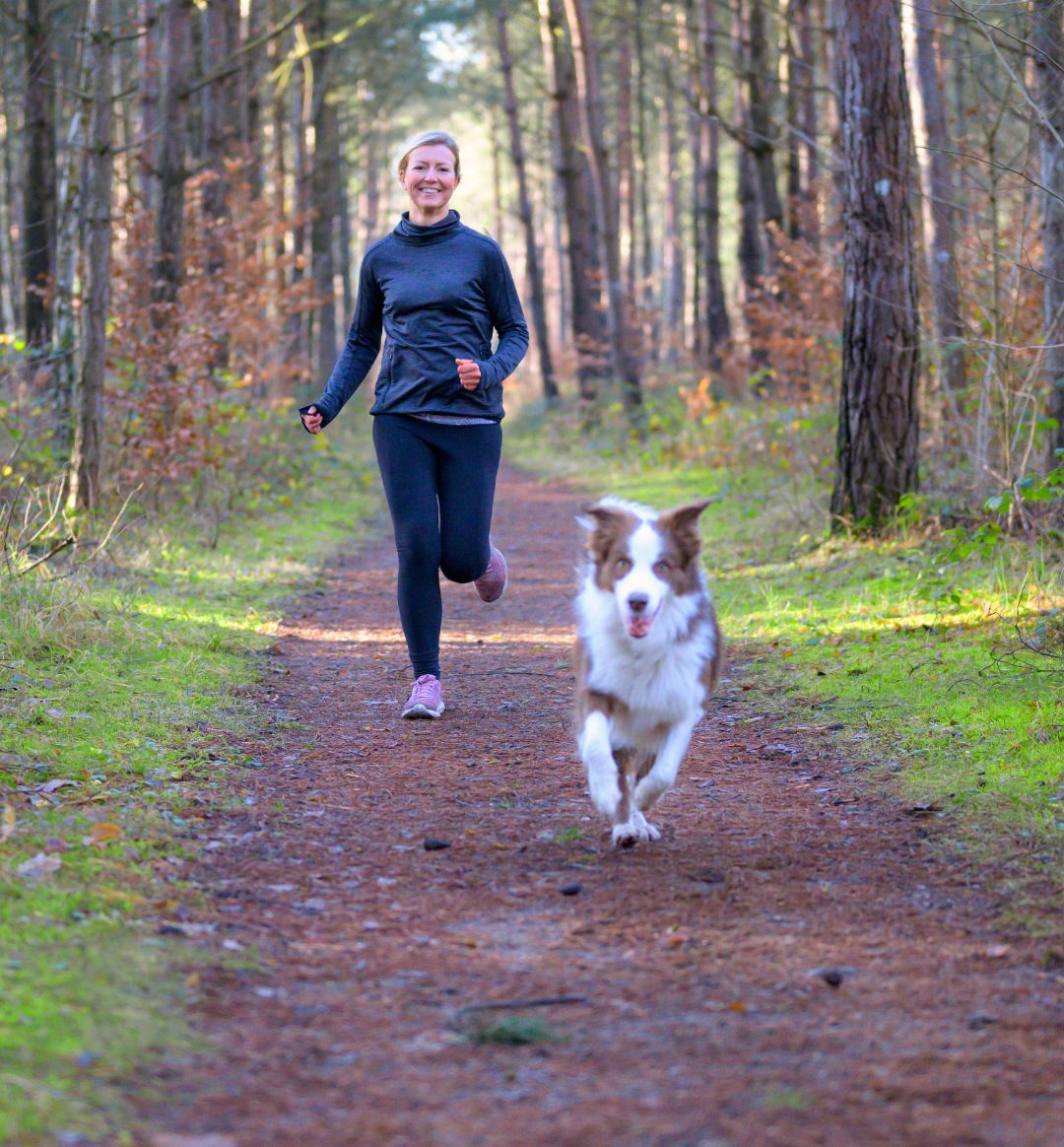Woman running with her dog.jpg