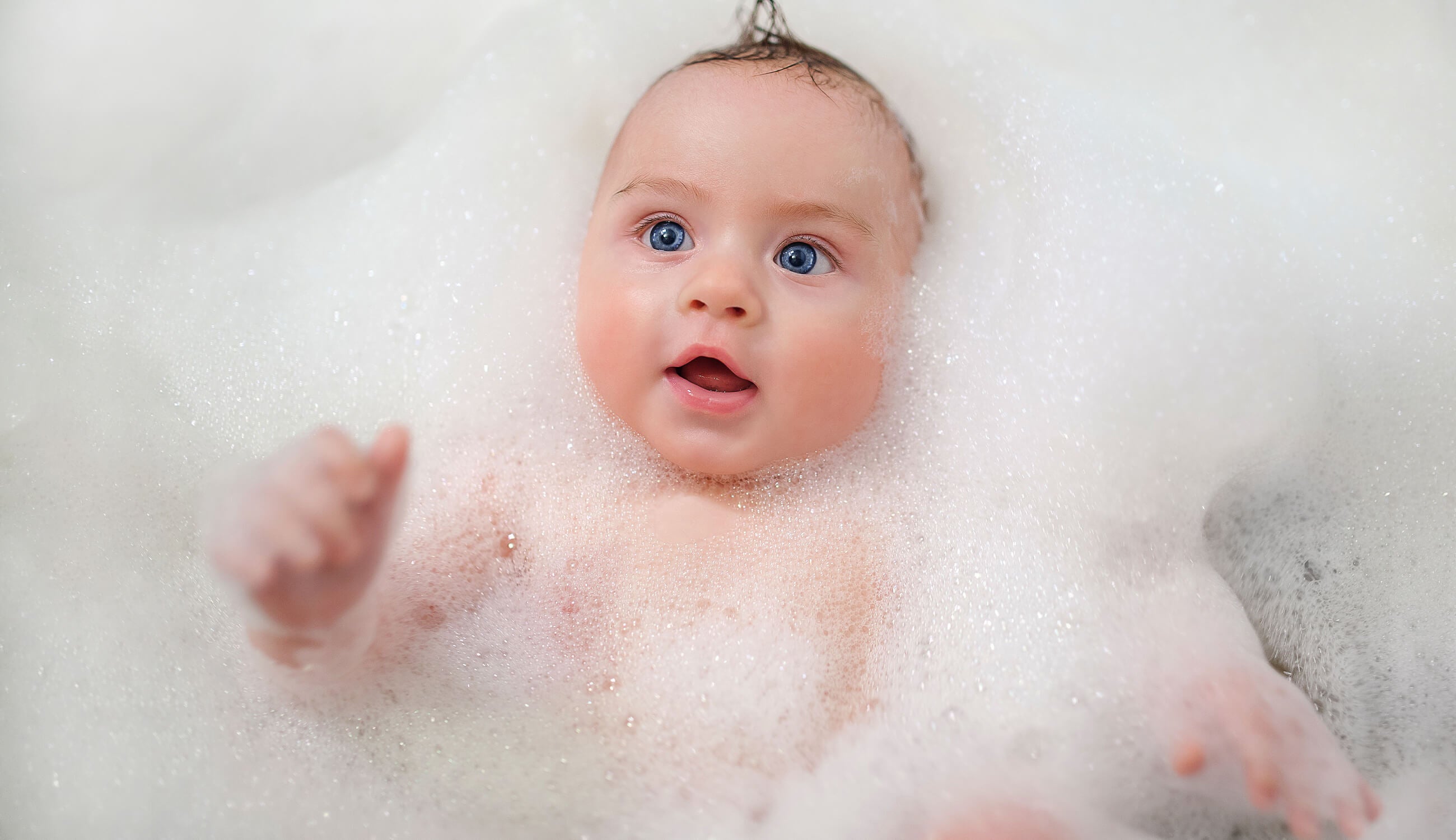 baby in bubble bath