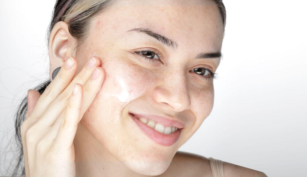 applying moisturizer to skin