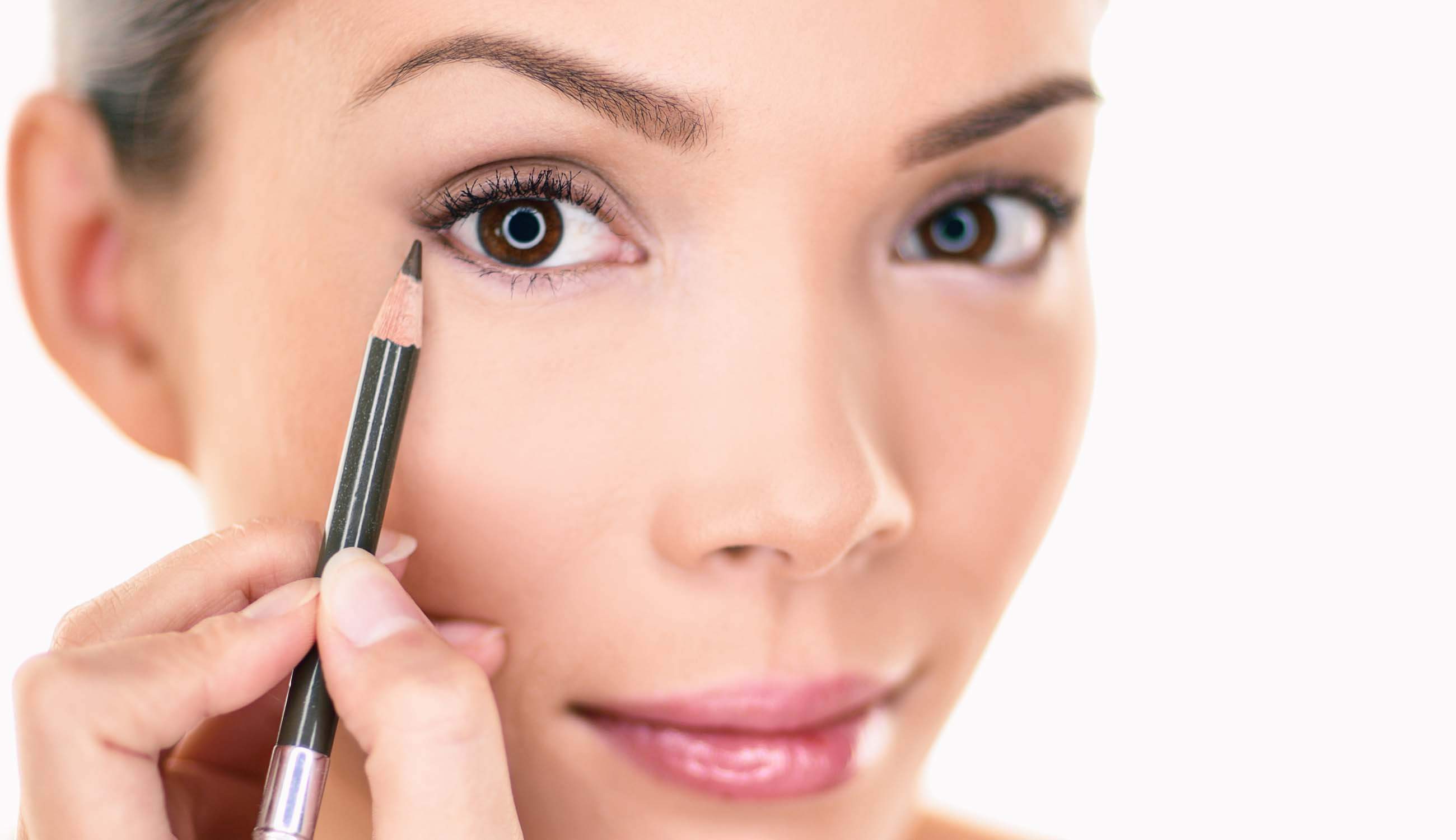 Main_woman applying pencil eyeliner.jpg