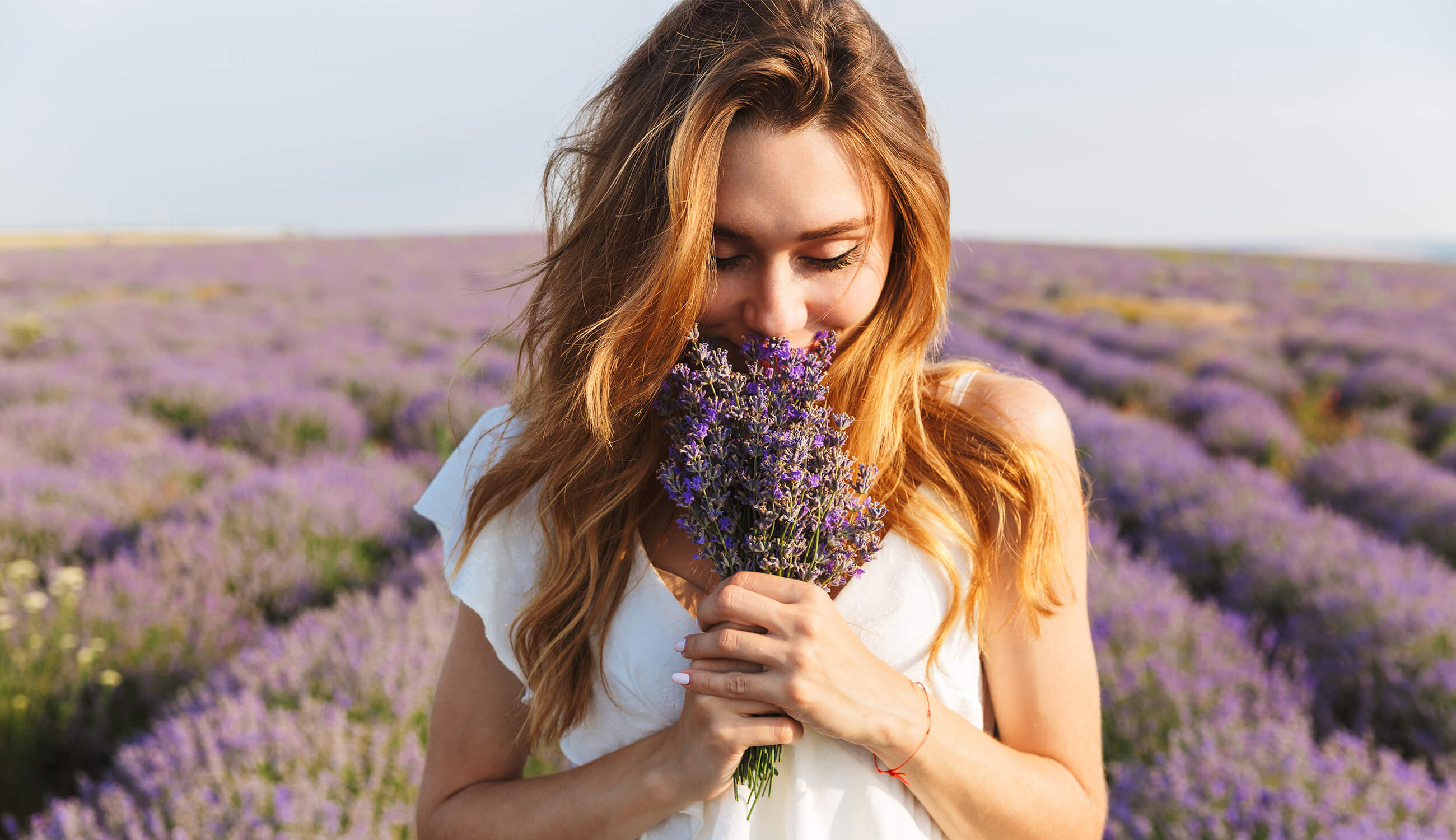 Main_young woman holding lavender