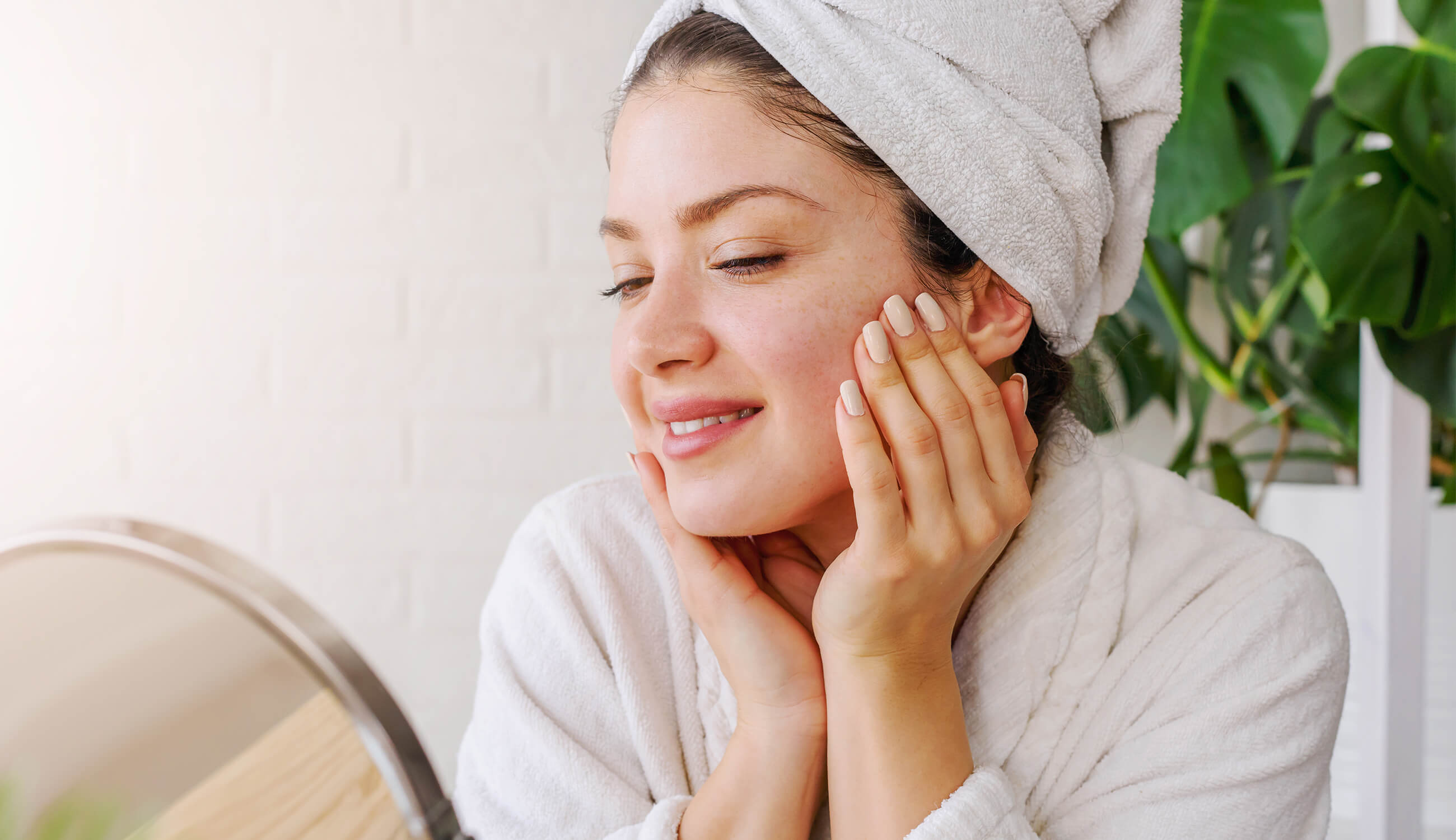 Main_young woman wearing bathrobe at home.jpg