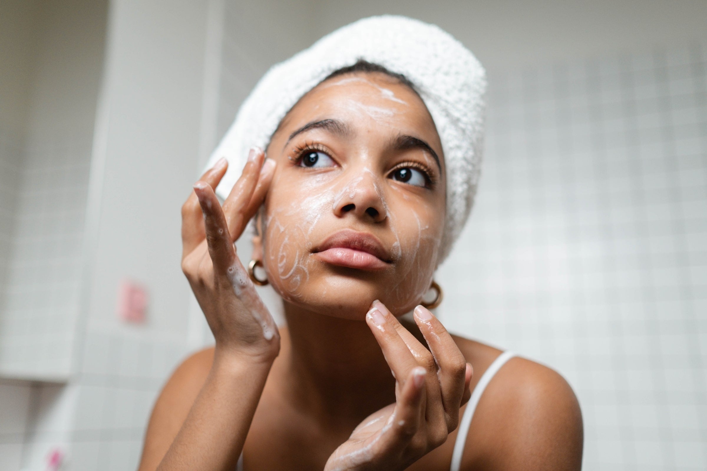 Woman gently washing her face