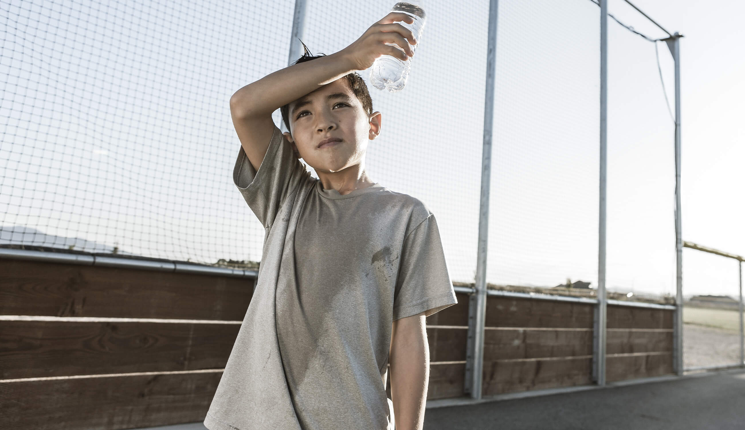 Teen sweating through shirt.jpg